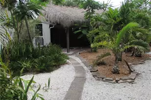 7697 Beach Daisy Ln, Bokeelia, FL 33922 - Photo 1