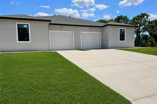 2325 W 12th St, Lehigh Acres, FL 33972 - Photo 1