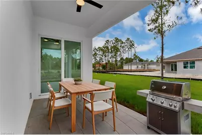 654 Trinity St E, Lehigh Acres, FL 33974 - Photo 26