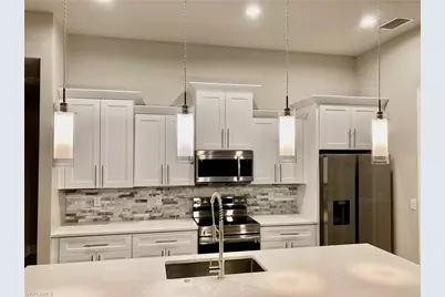 3911 22nd St SW, Lehigh Acres, FL 33976 - Photo 6