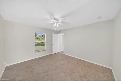 510 Beach Ave S, Lehigh Acres, FL 33974 - Photo 14