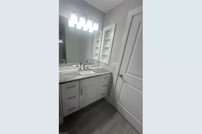 4169 NW 38th Pl, Cape Coral, FL 33993 - Photo 12