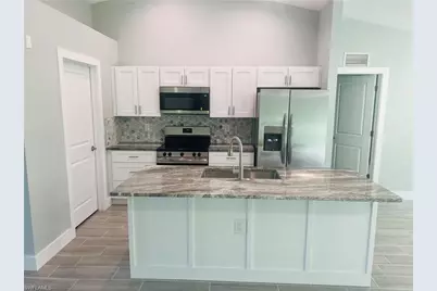 4169 NW 38th Pl, Cape Coral, FL 33993 - Photo 2