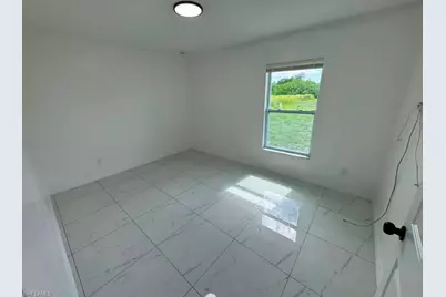 732 Ichabod Ave, Lehigh Acres, FL 33973 - Photo 16