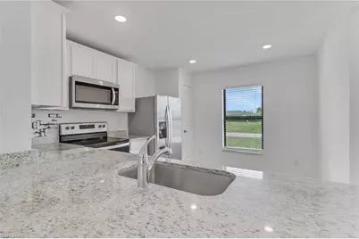 219 NW 25th Ter, Cape Coral, FL 33993 - Photo 22