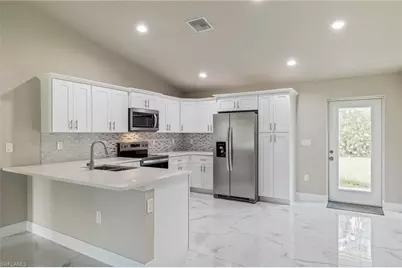 128 Sanborn Dr, Lehigh Acres, FL 33972 - Photo 2