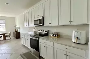 9291 Aqua Overlook Ct, Lehigh Acres, FL 33936 - Photo 18