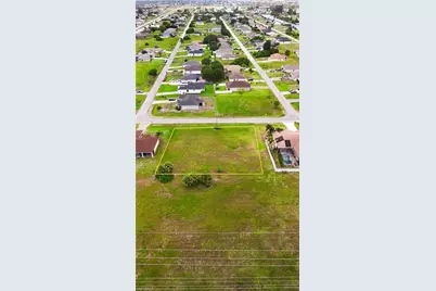 819 NW 24th Pl, Cape Coral, FL 33993 - Photo 2