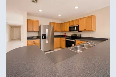3008 63rd St W, Lehigh Acres, FL 33971 - Photo 12