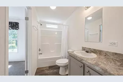 21190 Cypress Park Cir W, Estero, FL 33928 - Photo 14