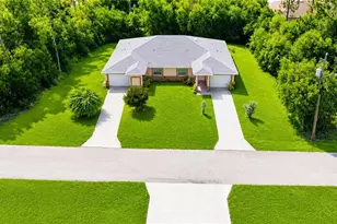2426 Millie Ave S, Lehigh Acres, FL 33973 - Photo 1