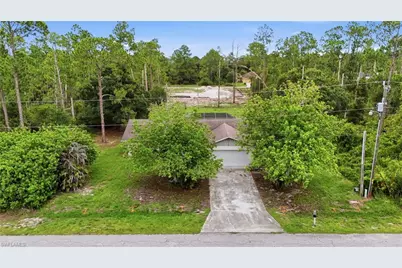 906 Wells Ave, Lehigh Acres, FL 33972 - Photo 2