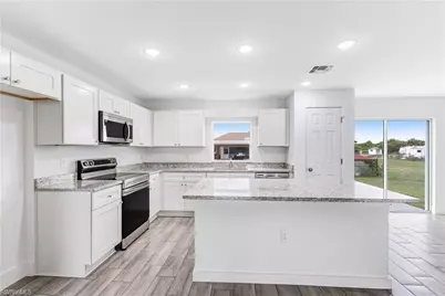 1242 Echard St E, Lehigh Acres, FL 33974 - Photo 4