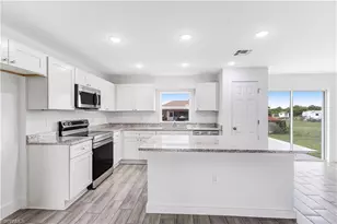 1242 Echard St E, Lehigh Acres, FL 33974 - Photo 4