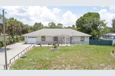 517 Plumosa Ave, Lehigh Acres, FL 33972 - Photo 1