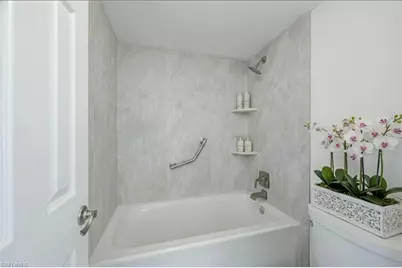 1087 Forest Lakes Dr #306, Naples, FL 34105 - Photo 10