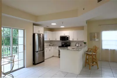 4450 Botanical Place Cir #301, Naples, FL 34112 - Photo 2