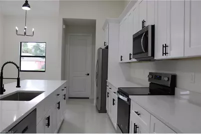 458 Windsor Ave S, Lehigh Acres, FL 33974 - Photo 22