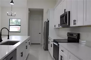 458 Windsor Ave S, Lehigh Acres, FL 33974 - Photo 22