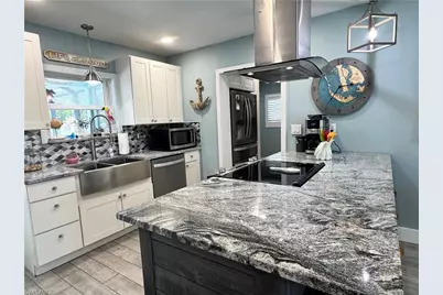 3772 Tropical Point Dr, Saint James City, FL 33956 - Photo 10