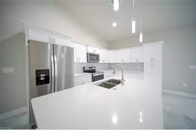 923 Binkley St E, Lehigh Acres, FL 33974 - Photo 4