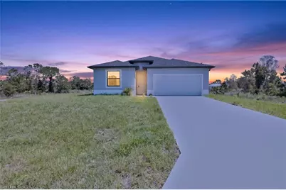 911 Panda Dr, Lehigh Acres, FL 33974 - Photo 1