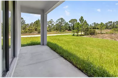 911 Panda Dr, Lehigh Acres, FL 33974 - Photo 42