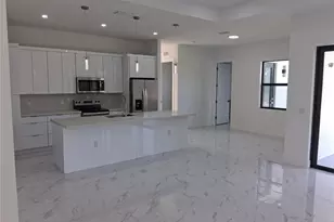 1106 Edelweiss St E, Lehigh Acres, FL 33974 - Photo 4