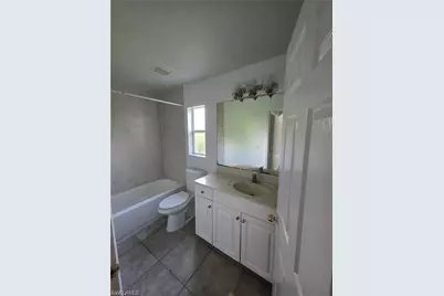 409 Hull Ave S, Lehigh Acres, FL 33974 - Photo 12