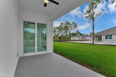 654 Trinity St E, Lehigh Acres, FL 33974 - Photo 26