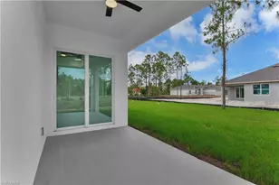 654 Trinity St E, Lehigh Acres, FL 33974 - Photo 26