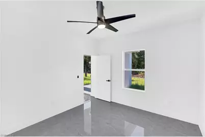 864 Chantilly St E, Lehigh Acres, FL 33974 - Photo 24