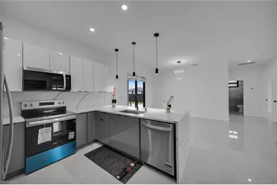 1302 NE Juanita Pl, Cape Coral, FL 33909 - Photo 12