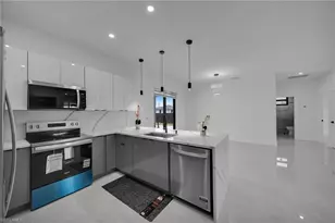 1302 NE Juanita Pl, Cape Coral, FL 33909 - Photo 12