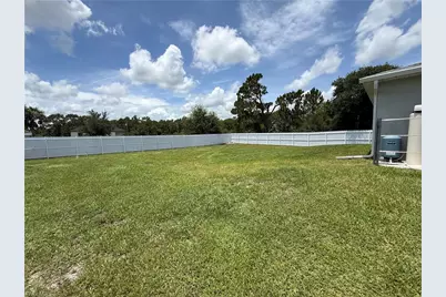 557 Oakshire Ln, Lehigh Acres, FL 33972 - Photo 18
