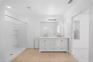 10464 Canal Brook Ln, Lehigh Acres, FL 33936 - Photo 20