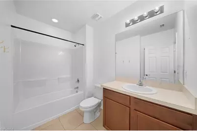 10464 Canal Brook Ln, Lehigh Acres, FL 33936 - Photo 14