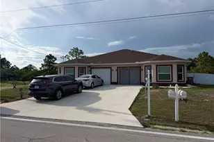 610 W 12th St, Lehigh Acres, FL 33972 - Photo 1
