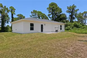1120 Ravenswood St E, Lehigh Acres, FL 33974 - Photo 6