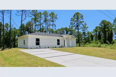 1120 Ravenswood St E, Lehigh Acres, FL 33974 - Photo 4