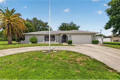 1634 Country Club Blvd, Cape Coral, FL 33990 - Photo 1