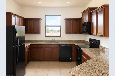 705 SW 23rd Ter, Cape Coral, FL 33991 - Photo 2