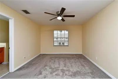 8585 Athena Ct, Lehigh Acres, FL 33971 - Photo 18