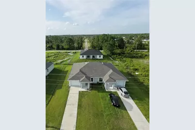 941 Jaguar Blvd, Lehigh Acres, FL 33974 - Photo 28