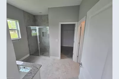 1021 Alcalde St E, Lehigh Acres, FL 33974 - Photo 12