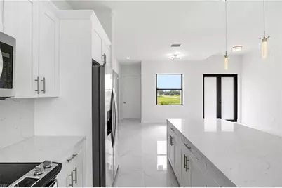 744 Oakridge Ave S, Lehigh Acres, FL 33974 - Photo 30