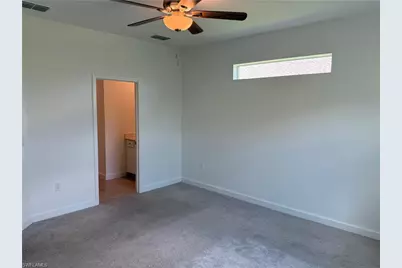 9093 Leatherwood Loop, Lehigh Acres, FL 33936 - Photo 16