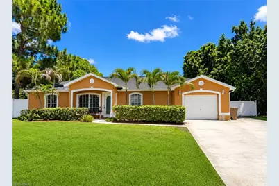 416 Candlewick Cir S, Lehigh Acres, FL 33936 - Photo 1
