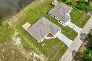 1012 Mexico Ave S, Lehigh Acres, FL 33974 - Photo 48