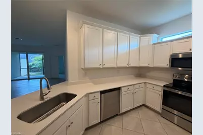 9077 Leatherwood Loop, Lehigh Acres, FL 33936 - Photo 14